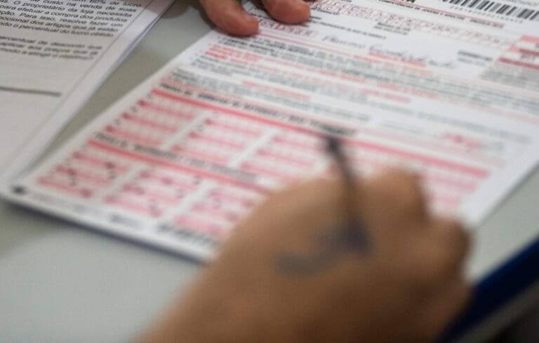 A vote filling out a ballot