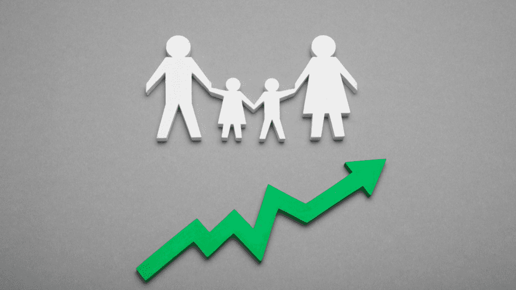 Family of four cut out of paper with a green upward facing arrow underneath